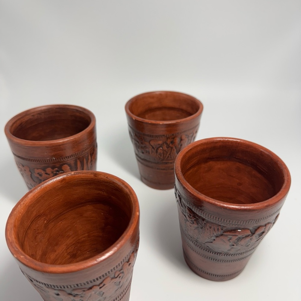 Four Handcrafted Clay Cups Handmade in Greece.  Three cups depict a celebration.